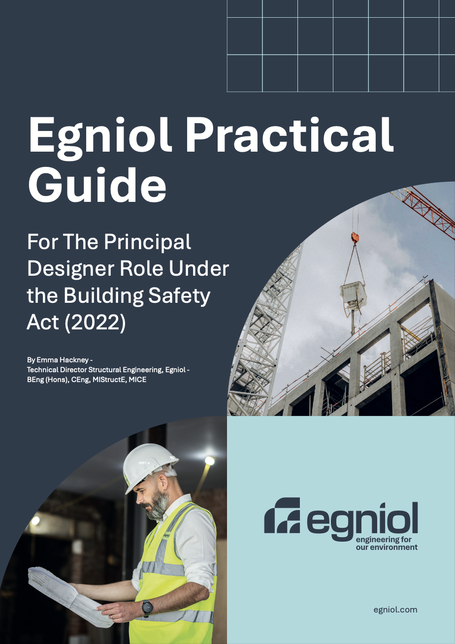 The front cover of the Guide shows a large building under construction and an engineer checking plans