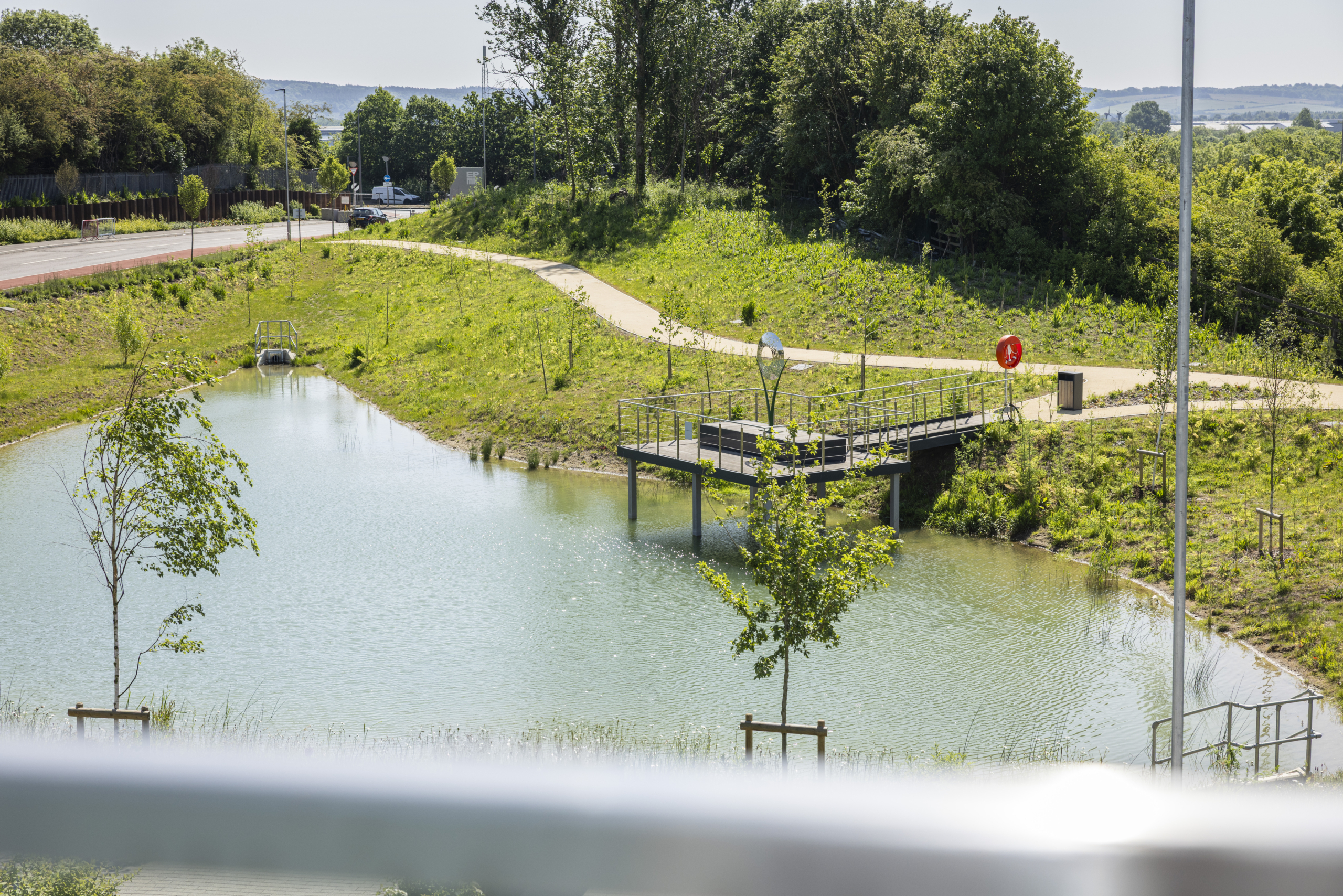A view of a lake as part of the SuDS scheme at Elfield Park