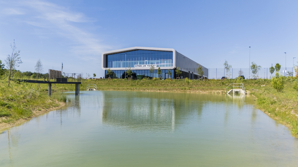Outside view featuring lake at Elfield Park Phase 1 development
